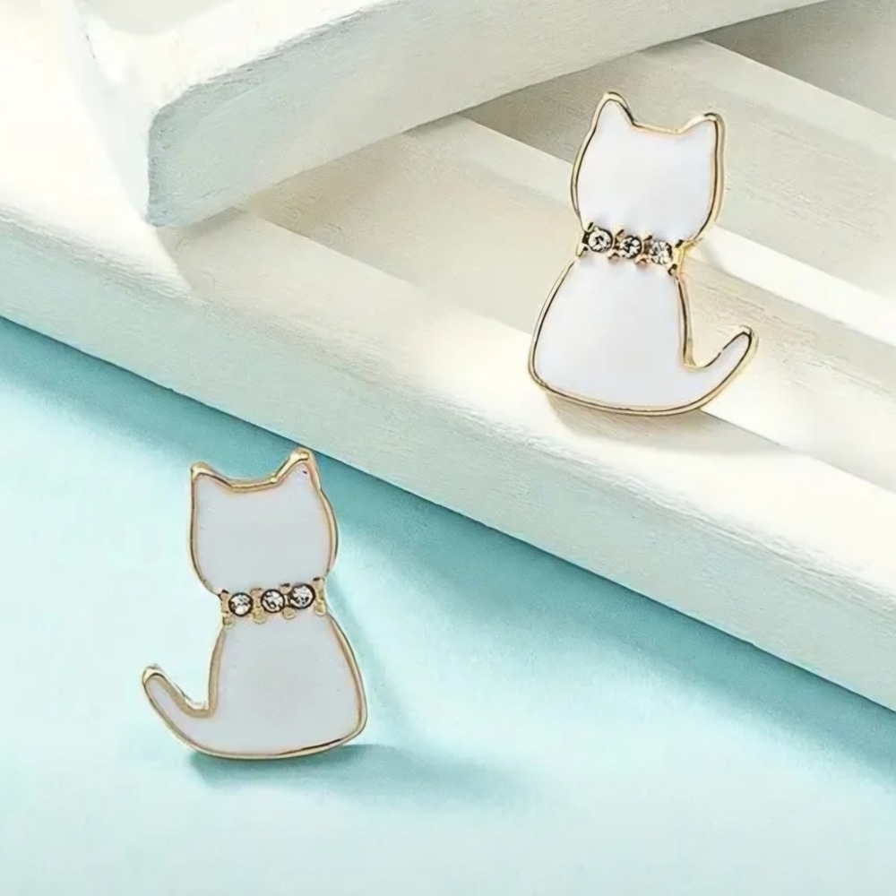 Elegant White Cat Earrings with Gold Accents